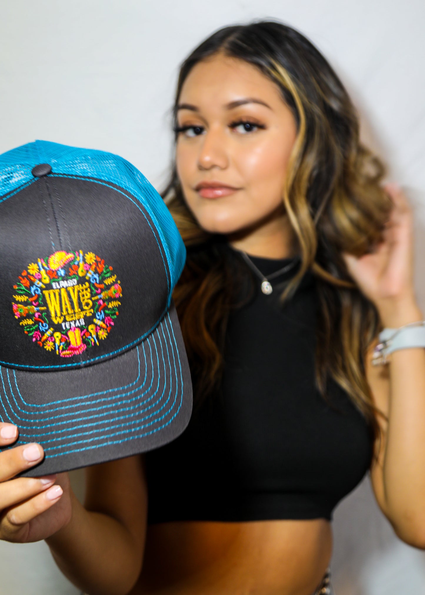 Embroidered WOW Neon Blue Trucker Hat